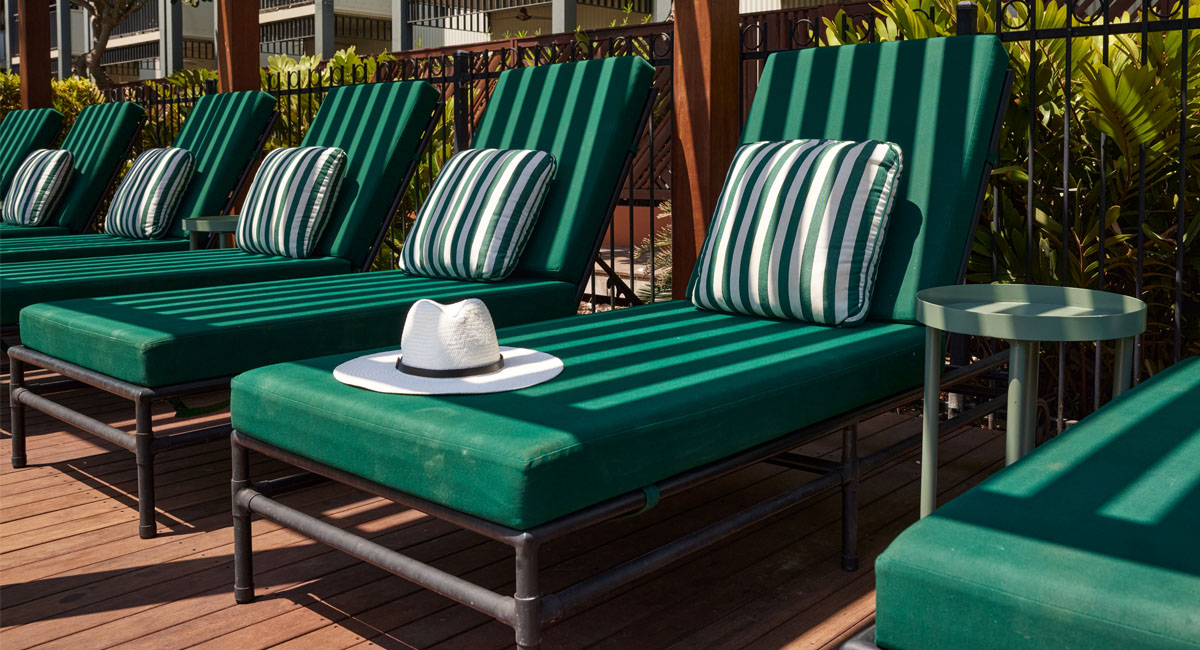 Image of general relaxation area by Pinctada Hotel poolside